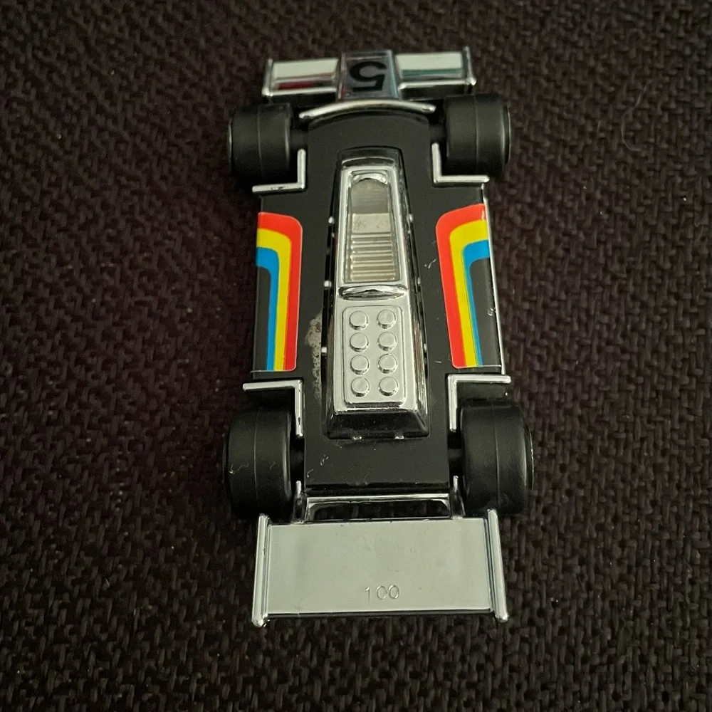 VTG 1979 Tonka black F1 race car w/ rainbow racing stripes